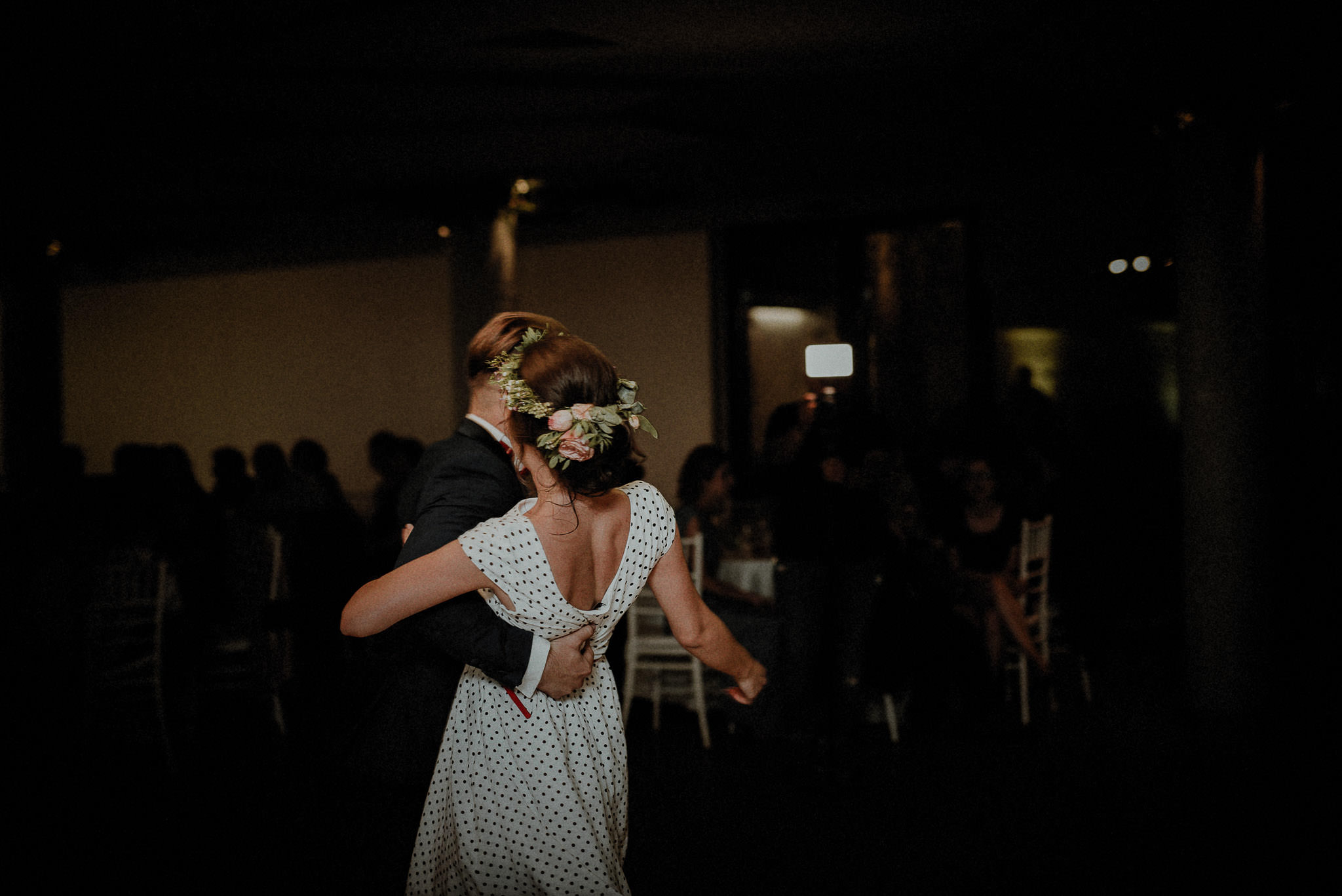 bride dancing with her brother on her wedding day