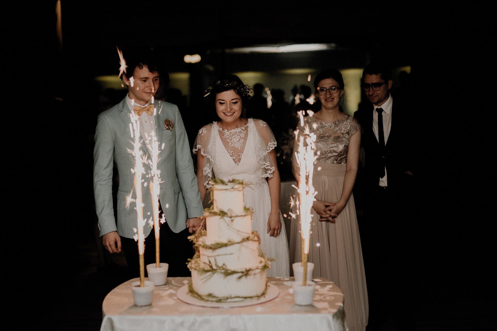 colourful wedding cake with sparkles brings happiness to the married couple