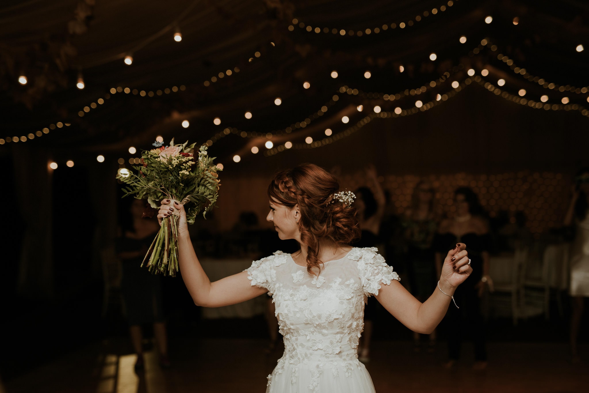 bride preparing to throw the bouquet
