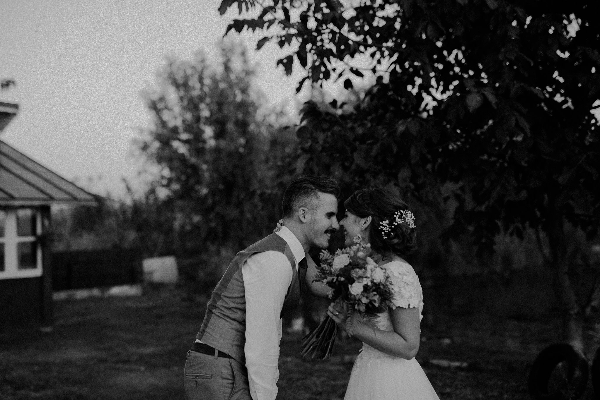 couple playing together on their wedding day