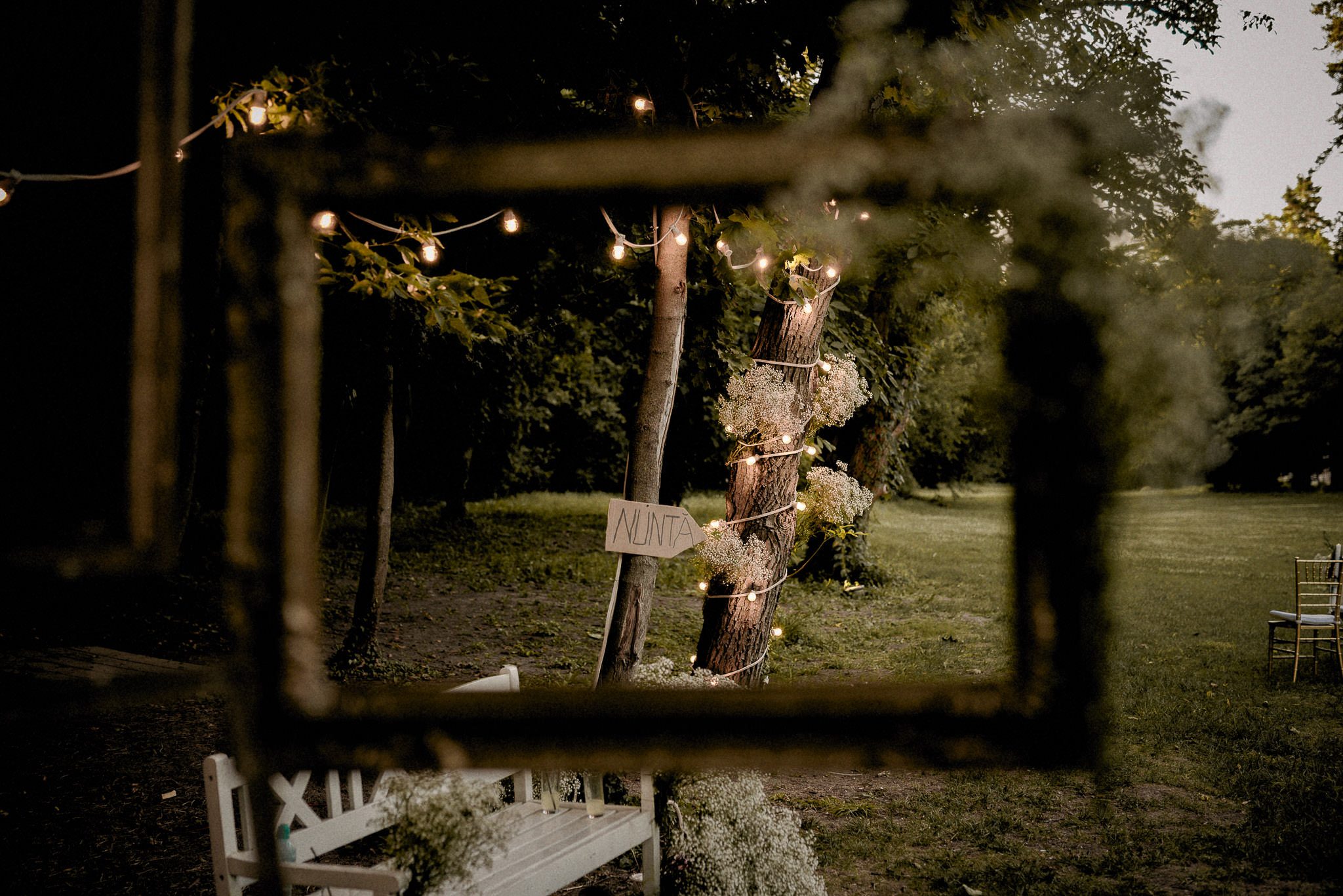 outdoor garden wedding details showing frames and natural elements