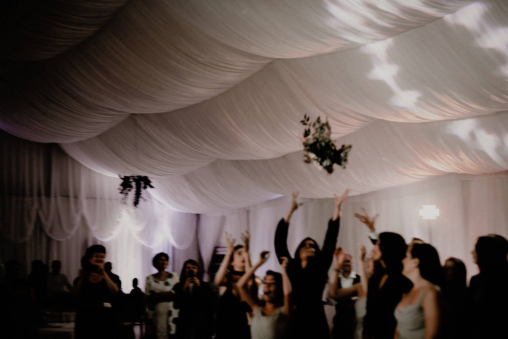 throwing the bouquet at the end of the bridal party