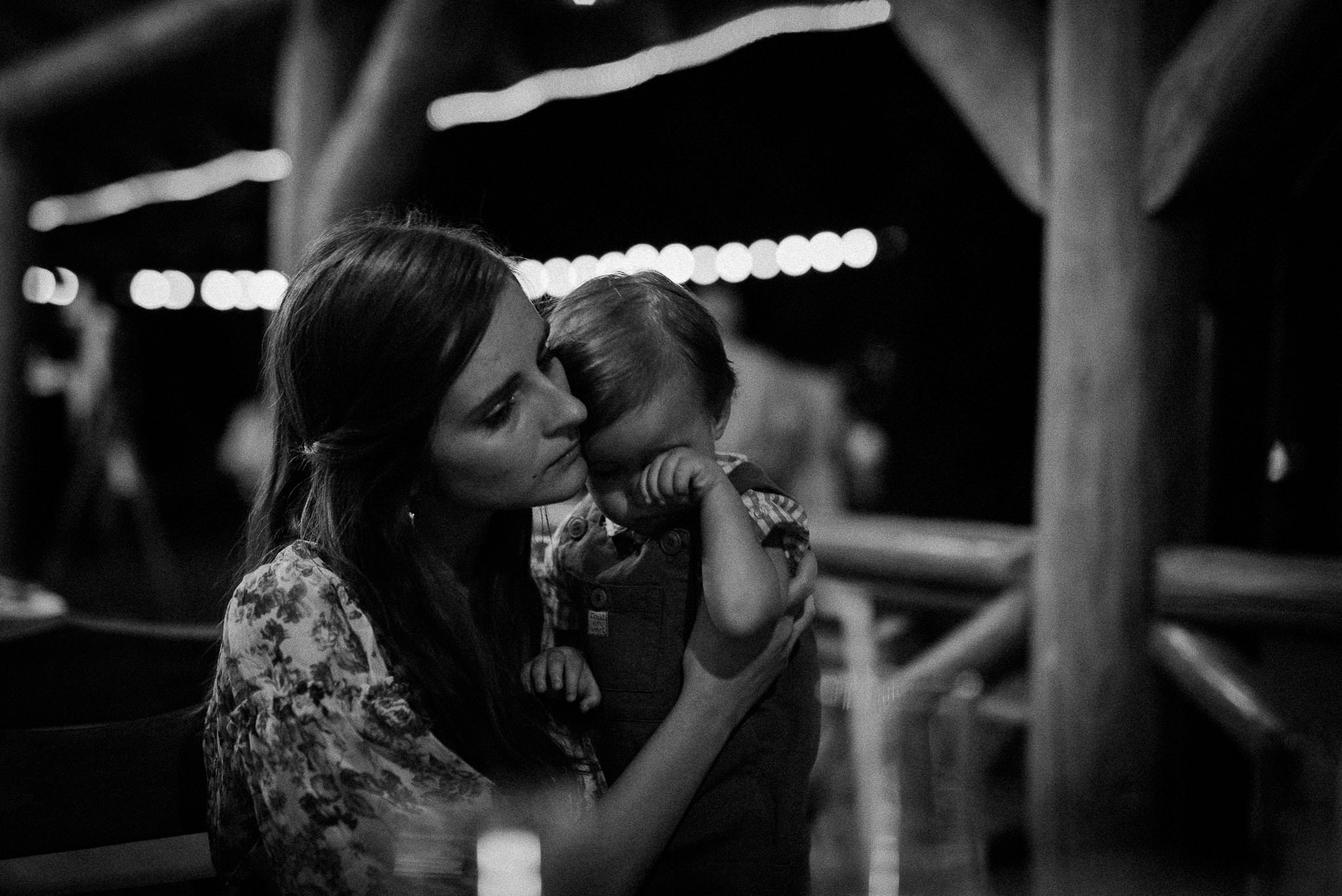 little boy feeling sleepy during the wedding party