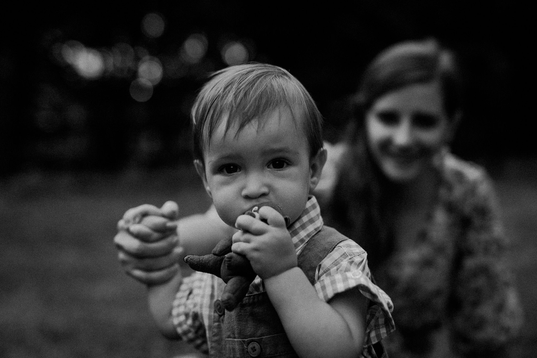 little boy playing during the outdoor wedding party